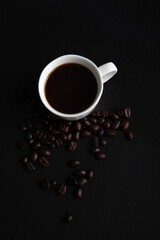Little white Cup of black expresso coffee