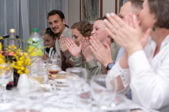 Family Celebrating Holiday With Songs.