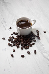 Little white Cup of black expresso coffee