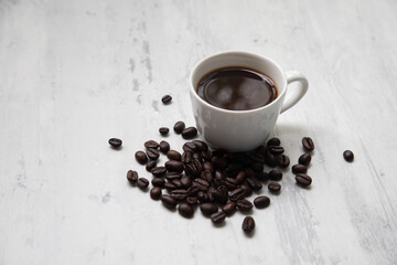 Little white Cup of black expresso coffee