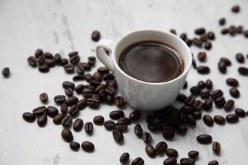 Little white Cup of black expresso coffee