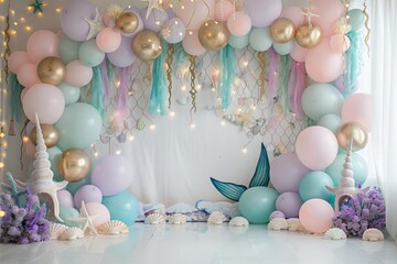 A room decorated with a lot of balloons and a mermaid theme