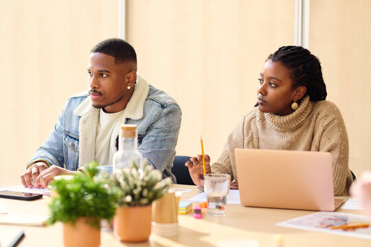 Focused duo Team listening  in Strategy Session