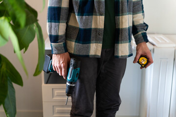 Man assemble furniture at new home