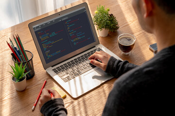 Software development programming on computer screen for modish application and program coding
