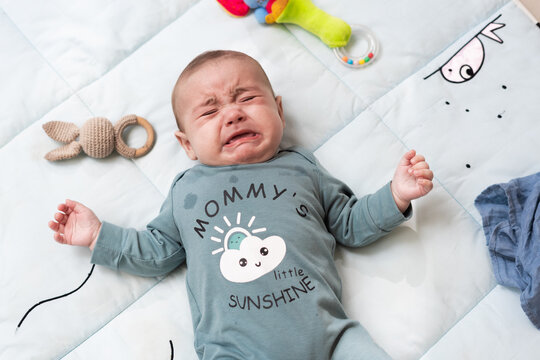 Baby crying in blanket 