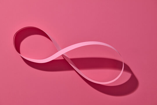 Abstract pink paper line infinity on pink