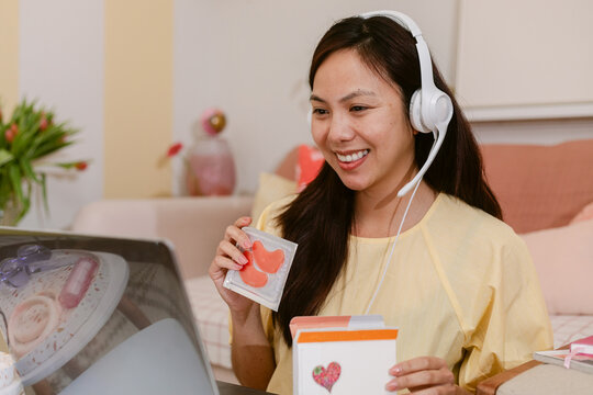 Unpacking Eye Patch  by Laptop