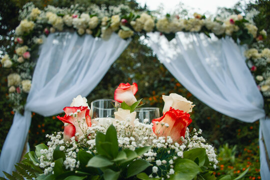 Wedding floral Arch with Floral Decorations in Nature