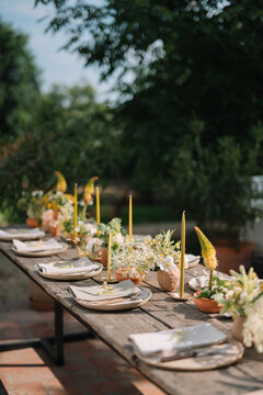 Elegant outdoor dining table with natural decor