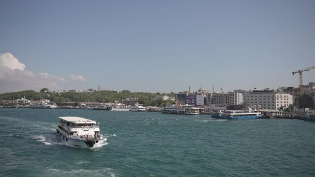 Ships, ferries, boats, historical buildings in the Bosphorus, Istanbul, Turkiye
