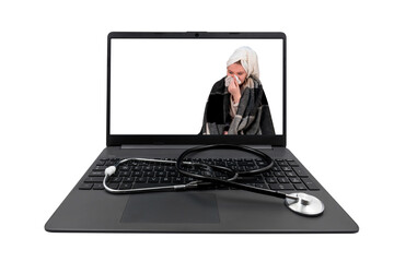 Laptop and medical stethoscope isolated on transparent background. On the laptop screen - a girl with cold symptoms blows her nose into a paper handkerchief