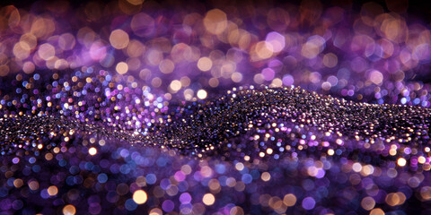 background of abstract glitter lights. purple, gold and black banner
