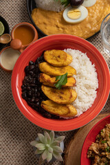 Black beans and white rice with fried plantains banana cuban venezuelan food