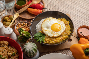 Quinua quinoa stew with cheese and fried egg peru peruvian andean food