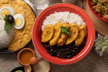 Black beans and white rice with fried plantains banana cuban venezuelan food