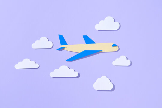 Aircraft in the blue sky. Flight airplane and white clouds