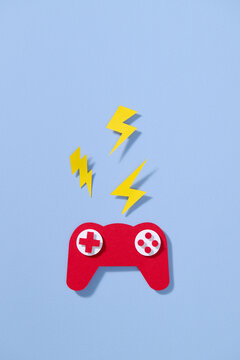 Top view of the red paper game controller