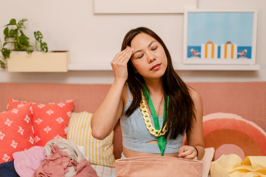 Woman Using Oil Blotting Paper 
