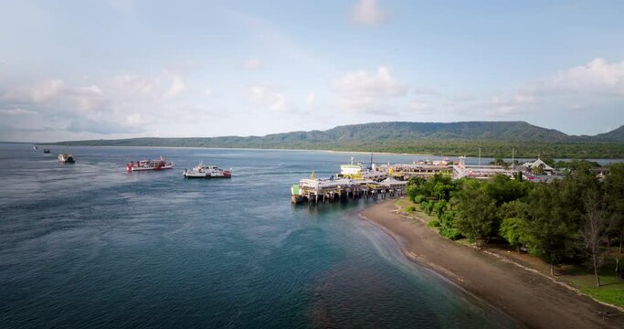 Aerial view of Gilimanuk port with ferry boats departing from Bali to the island of Java
