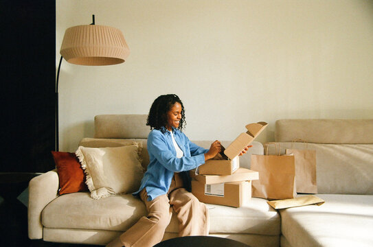 Film Photo Woman Online Shopping Unboxing at Home