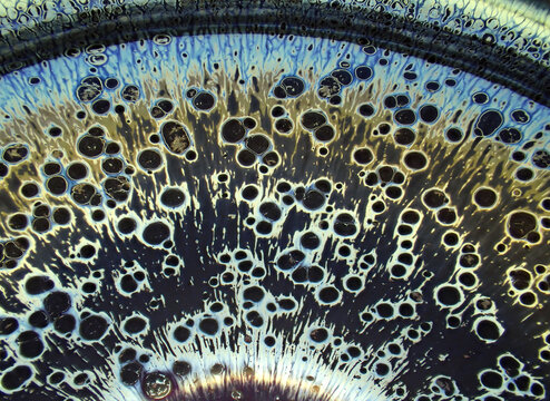 Textured background of microscopic glaze of Chinese ceramics tea cup