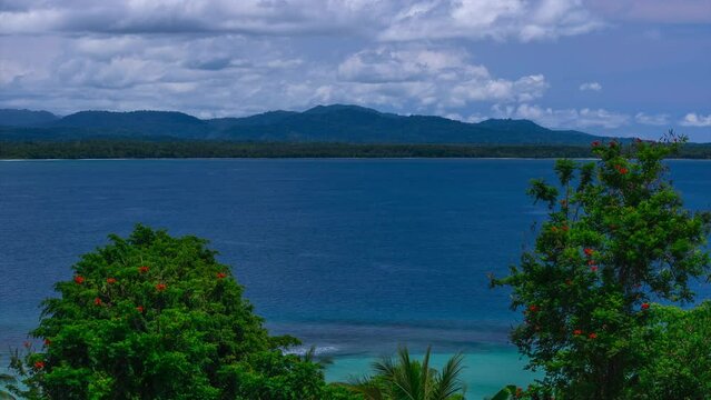 Tropical tide South Pacific Ccean bay Wewak East Sepik River Province capital district Papua New Guinea Timelapse time lapse clouds sunshine sunny daytime Tropical islands Madang Northern Coast