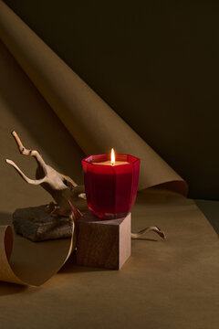 Spa composition with burning candles on massage table