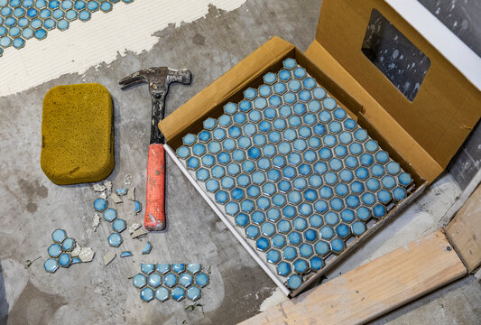 Tiling Construction in Residential Home Improvement renovation hammer