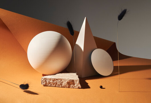 Geometric still life with earthy tones and textures.