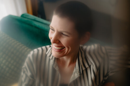 Queer Joy - intimate closeup woman laughing