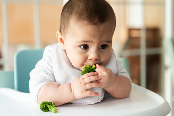 Baby's first taste of broccoli