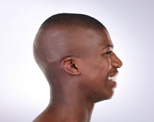 Skincare, smile and profile of black man in studio for dermatology, treatment and wellness. Happy, male person and pride with confidence on white background for cosmetics, self care and satisfaction
