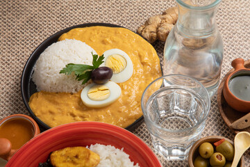 Aji de gallina chicken cream with rice and boiled eggs Buffet table full of lunch assorted dishes...