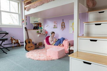 Girl Artist Creative in home draws with stylus pen tablet computer