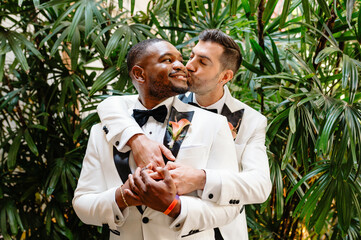 LGBTQ+ wedding men candid photo