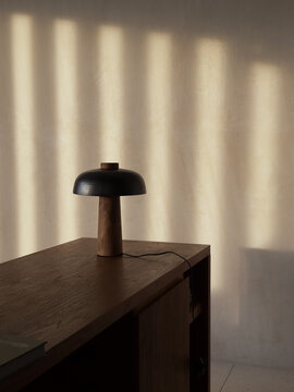 Minimalist Desk with Lamp and Shadow Play