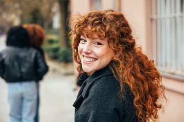 Redhead Girl Enjoying Time With Friends in Madrid