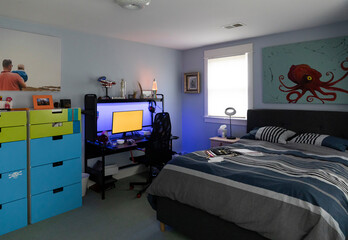 Video gaming Computer desk at home bedroom interior with nobody
