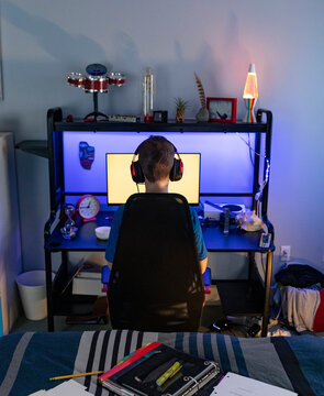 Young Boy Portrait video Gamer desk Computer at home bedroom 