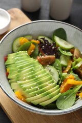 Healthy dish high in vegetable fats in bowl on table, closeup