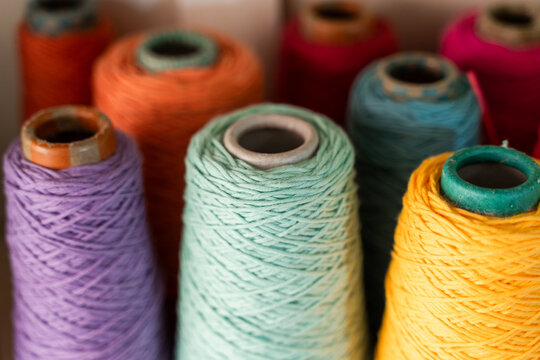 Colorful array of sewing thread spools