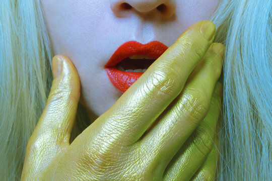 Conceptual performance unreal colours theatre face makeup closeup 