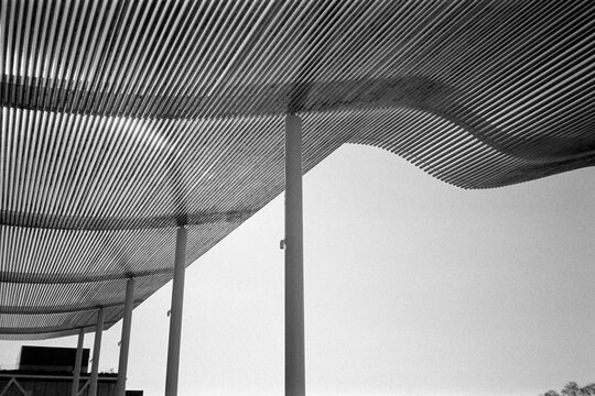 Slatted Pavilion with a wave pattern