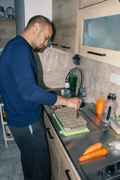 Man Preparing Homemade Kibbes for Lunch