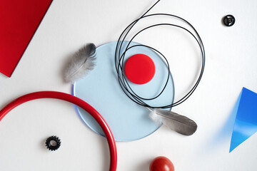 Abstract composition with red and blue elements. Geometric still life