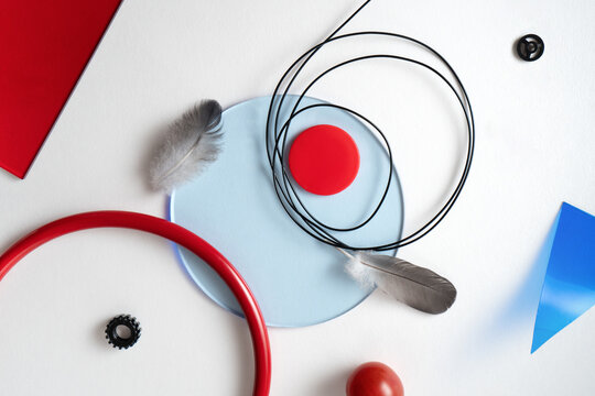 Abstract composition with red and blue elements. Geometric still life