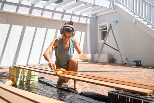 diy home improvement oiling decking planks