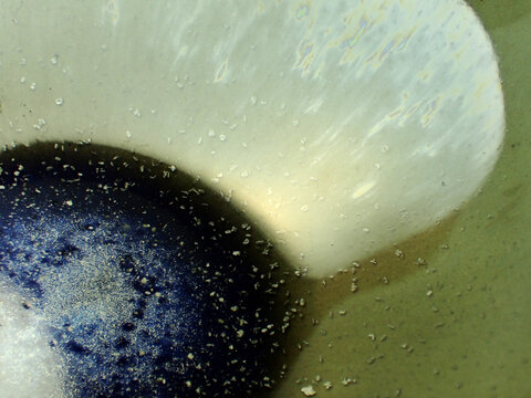 Textured background of microscopic glaze of Chinese ceramics tea cup