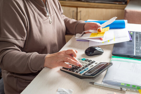 Accountant counts on a calculator